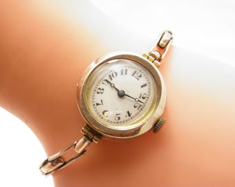 Reloj de pulsera Vertex Revue antiguo de oro de 9 quilates con 15 joyas, suizo, década de 1920, en buen estado de funcionamiento.