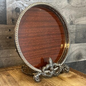 Vintage Small Crescent Silverplated Round Raised Rim Tri Footed Tray with Wood Tone Base