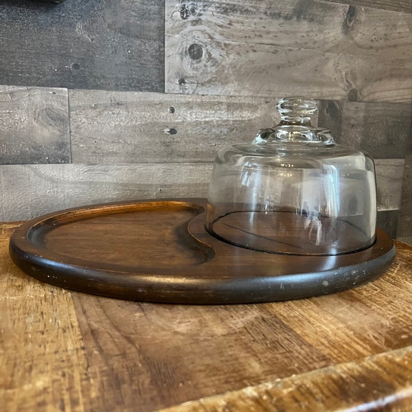 Vintage oval wooden charcuterie board with clear glass dome