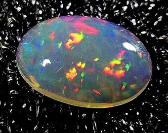 Natural VVS AAA Marvelous Colour Play Oval Cabochon Ethiopian Opal 1.80 CTS
