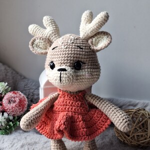 Handmade Crochet Reindeer – Christmas Crochet Animal Toy in Pink Jumpsuit main image 1