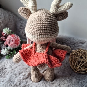 Handmade Crochet Reindeer – Christmas Crochet Animal Toy in Pink Jumpsuit main image 0
