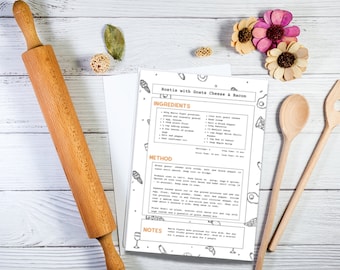 Könnte beinhalten: Eine druckbare Rezeptkarte für die Zubereitung von Roasties mit Ziegenkäse und Speck. Die Karte zeigt eine Schwarzweißillustration eines Bratens, eines Weinglases und einer Gabel. Die Zutaten und die Zubereitung sind in schwarzem Text mit orangenen Überschriften aufgeführt.