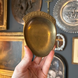 May include: A white ceramic mug with a black handle and the text "But First, Coffee" in a handwritten style. The mug is likely 12 ounces in capacity, perfect for a morning beverage.