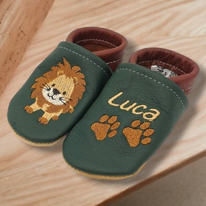 crawling shoes with the name Lion