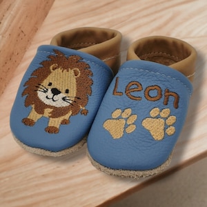 crawling shoes with the name Lion