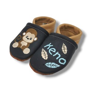 crawling shoes with the name monkey
