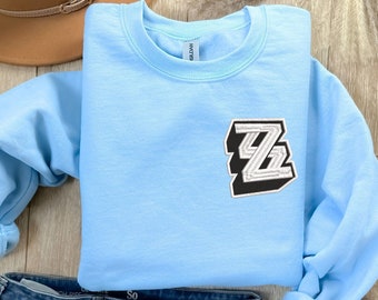 Zenless Zone Zero BRODERAD tröja, premium anime-inspirerad unisex-tröja, mysig streetwear, perfekt present för spelare och animefans
