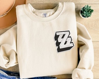 Zenless Zone Zero BRODERAD tröja, premium anime-inspirerad unisex-tröja, mysig streetwear, perfekt present för spelare och animefans