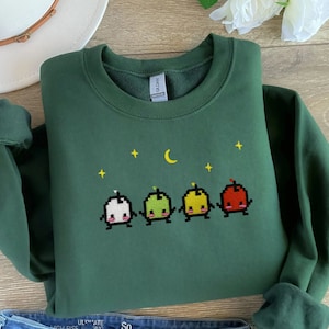 EMBROIDERED Stardew Valley Junimo Sweatshirt, Geek Chic Style, Cozy Gamer Fashion, Cozy Gamer Apparel, Gamer Fashion Must-Have