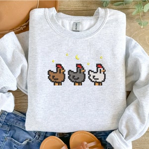 Light Grey Stardew Valley Chicken Sweatshirt – Cozy Neutral-Tone Gamer Apparel Featuring Three Embroidered Pixel Chickens