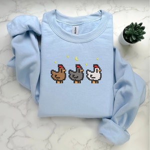 Sky Blue Stardew Valley Chicken Embroidery Sweatshirt – Whimsical Farm-Inspired Gaming Fashion