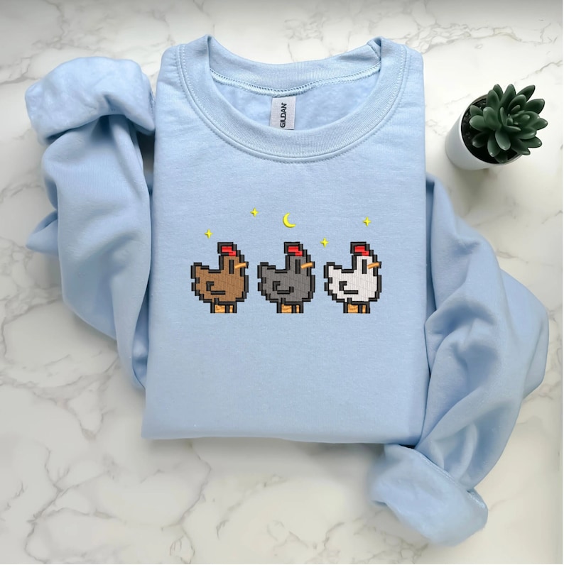 Sky Blue Stardew Valley Chicken Embroidery Sweatshirt – Whimsical Farm-Inspired Gaming Fashion