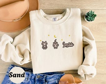 Felpa con ricamo a forma di gatto di Stardew Valley, girocollo da gamer, top cottagecore stravagante, grazioso regalo unisex con grafica pixel art per gli amanti dei gatti.