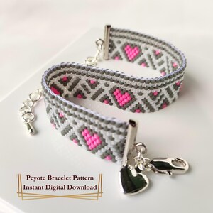 May include: A beaded peyote bracelet with a pattern of gray and white geometric shapes and pink hearts. The bracelet has silver-colored clasps and a heart-shaped charm. The text "Peyote Bracelet Pattern Instant Digital Download" is at the bottom.