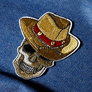 Stryklapp med dödskalle och cowboymotiv (6,5 x 8 cm)
