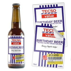 May include: A brown beer bottle with a silver cap and a label that reads "TECSO value BIRTHDAY BEER". The label also includes the text "Helping you get drunk for less" and "Every tipple helps". The bottle is 70cl.