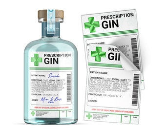 May include: A clear glass bottle of "Prescription Gin" with a wooden stopper and a label that resembles a prescription. The label includes the text "Patient Name: Sarah" and instructions. A second label is partially peeled off.