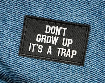 Don't Grow Up It's A Trap Black Iron On Patch (7.8 x 5cm)