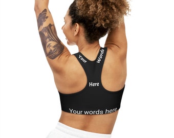 May include: Black sports bra with white text that reads "Your Words Here" on the straps and "Your words here" on the bottom band.