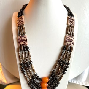 Vintage and beautiful hand carved 4 strand tribal theme yak bone necklace 27”inch long