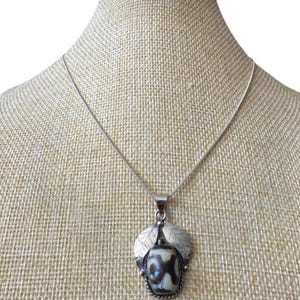 Stunning handcrafted and vintage fruit shape two Eye Tibetan Agate (Dzi)Stone Amulet Pendant set in Tibetan silver 2”inch tall and 4.70grams
