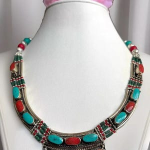 Stunning Handcrafted tribal theme Pendant necklace inlay with Turquoise and coral stone set in Tibetan silver 18” long & 127grams.