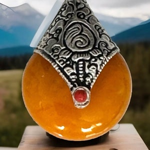 Stunning traditional handmade Tibetan double side pendant with coral touch set in Tibetan silver 1.7”inches tall and 8.74 grams