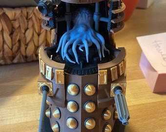 Dalek Caan from Doctor Who opened
