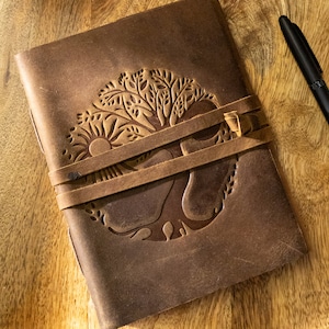 Handmade 8 x 6 Leather Journal with Tree of Life, Sun, and Moon embossing. Lined craft paper, ideal for writing or Book of Shadows.