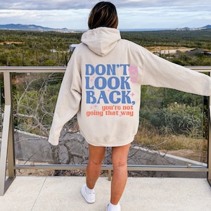 Black hoodie with orange writing sales