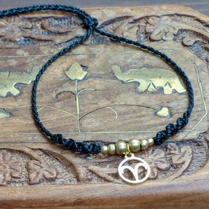 Sternzeichenarmband Makrameearmband Schwarz/Gold | Sternzeichenschmuck | Horoskop Armband | Personalisiertes Armband | Edelstahl Anhänger