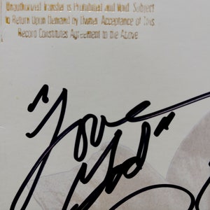 Prince signed album cover. HUGE clear autograph. AND Prince Gold record (awarded to producer Benny Medina)