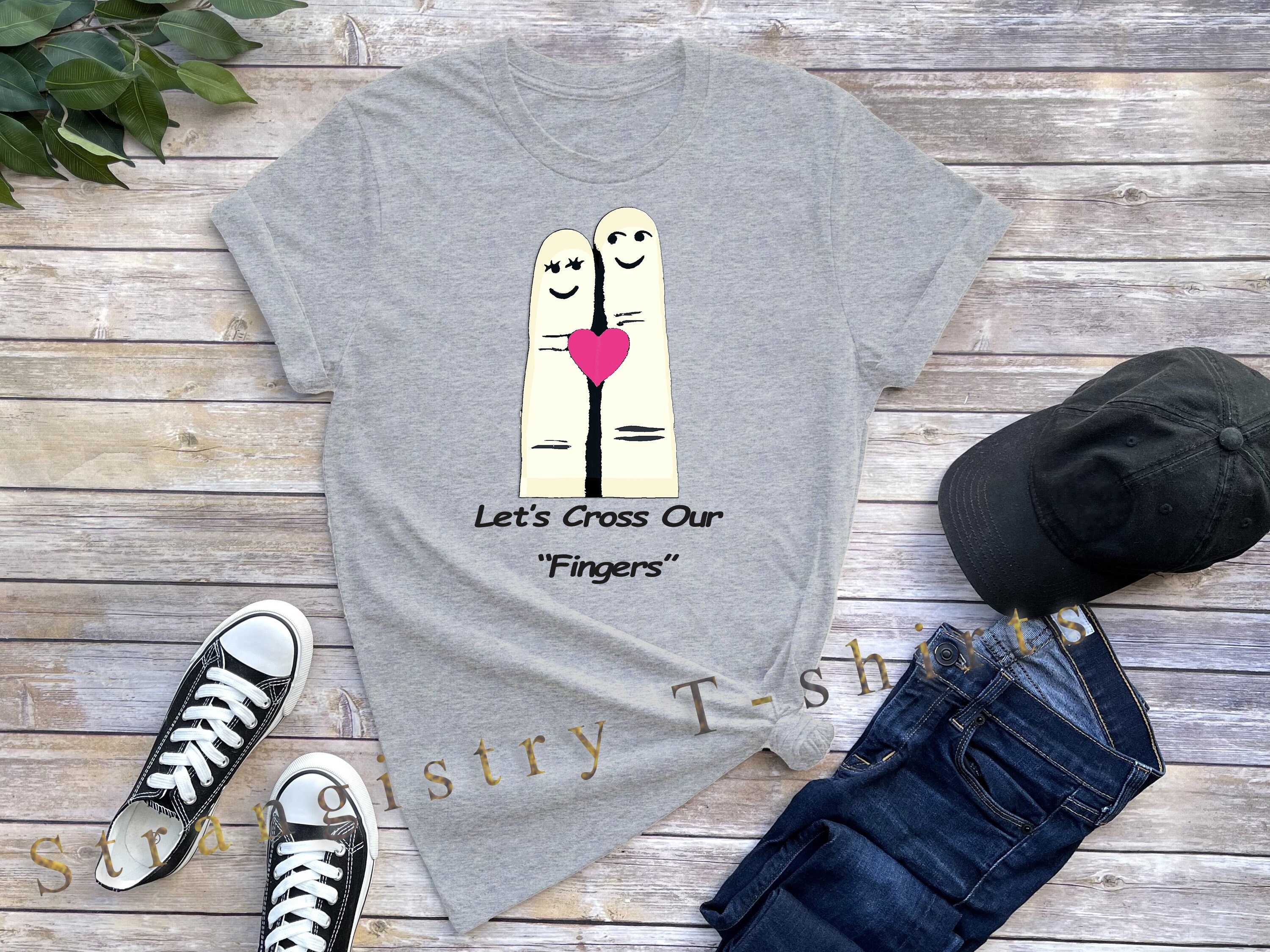 Cute Love Custom T-shirt with Text of “Let’s Cross our Fingers”. Funny Graphic Design Love Shirt for Couples and Crushes.