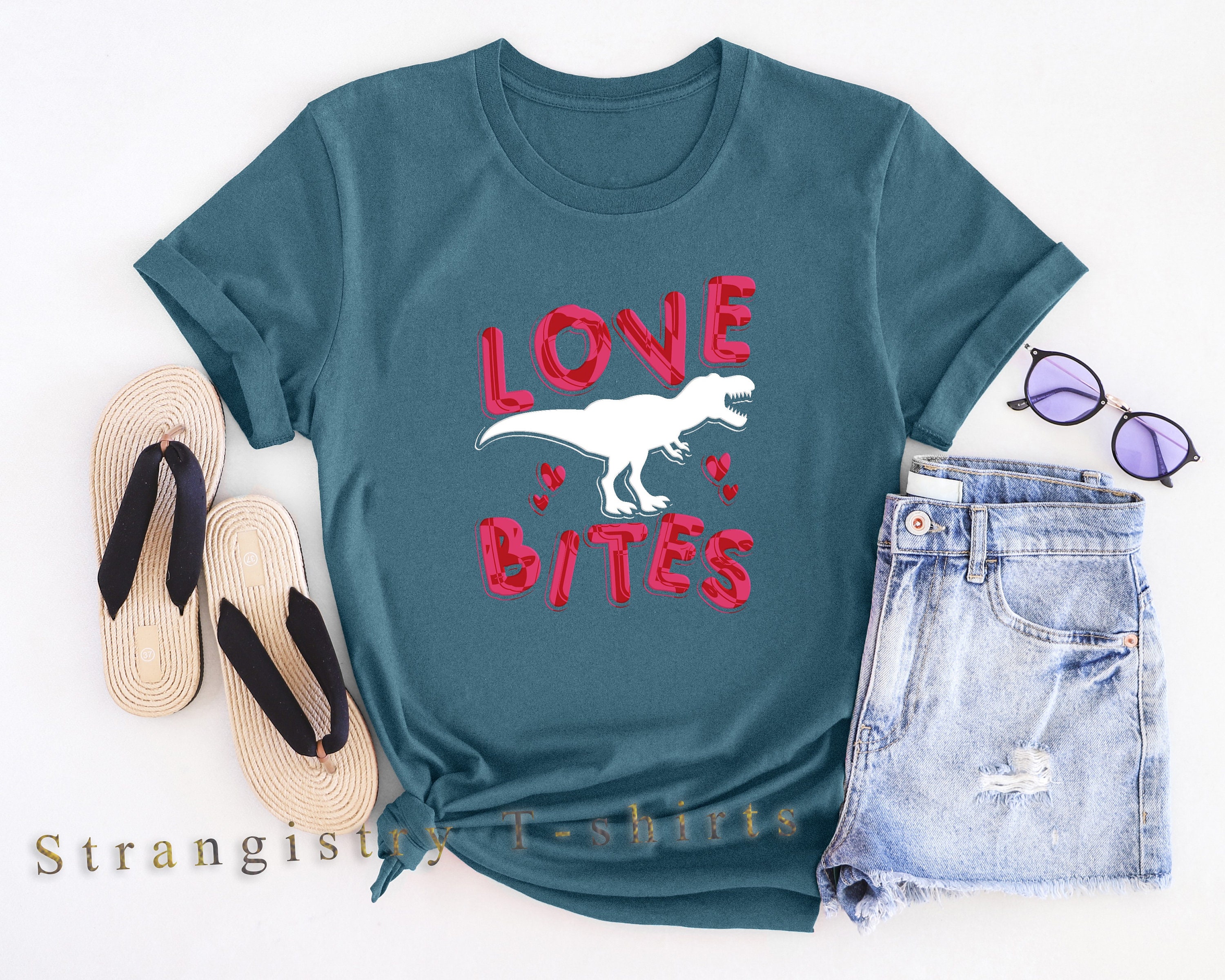 Love T-shirt with Dinosaur Design for Women Streetwear. Graphic Design Shirt with the Text of “Love Bites”. Cool Love Tshirt for Women