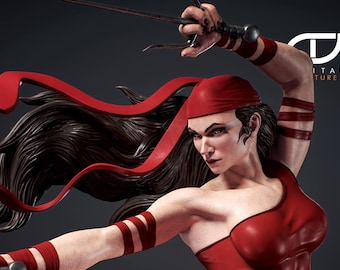 May include: A detailed statue of a female character in a dynamic pose, wielding two sai. She wears a red head covering, top, and armbands. Long, dark hair flows behind her. The statue has a serious expression. The Digital Pictures logo is in the background.