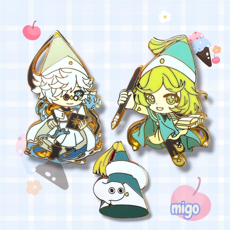 May include: Three enamel pins featuring two anime-style characters in pointed hats and a small white creature. One character holds a book with a star, the other holds a pen and book. The third pin is a pointed hat with a small white creature attached.