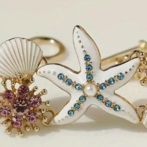 BRACELET- Ocean Theme Starfish & Seashell Bracelet with Sparkling Rhinestones - White and Golden-Tone Zinc Alloy Beach Jewelry