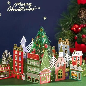 CARTÃO POPUP - Cartão de felicitações de vila de Natal com casas decoradas - Design cortado a laser com envelope