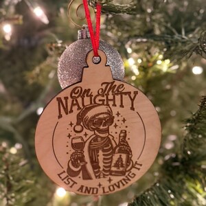 On the Naughty List and Loving it Skeleton Christmas Ornament Unique Gag Gift Laser Engraved Wood Ornament