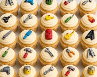 May include: A collection of cupcakes with vanilla frosting, each topped with a miniature tool decoration. Tools include a wrench, hammer, saw, paint can, drill, and pliers. The cupcakes are arranged in neat rows.