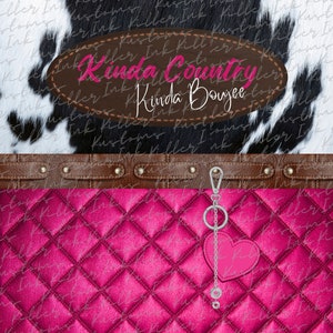 May include: A pink quilted handbag with a brown leather strap and a silver heart charm attached to a chain. The text "Kinda Country Kinda Boujee" is written on a brown oval background.