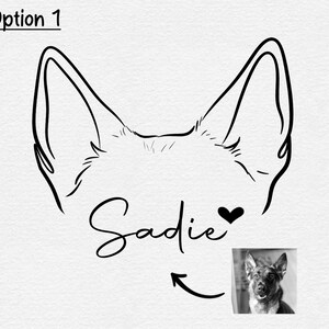 May include: Line art drawing of a dog's head with the name Sadie and a heart below. A photo of a dog is below the drawing with an arrow pointing to it.