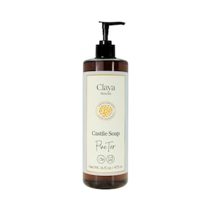 May include: A brown bottle of Castile Soap with a black pump dispenser. The label reads "Claya Skincare" and "Pine Tar." The bottle contains 16 fl oz / 473 ml of soap. The label also features a circular graphic with the words "Always Made With Clean Ingredients."