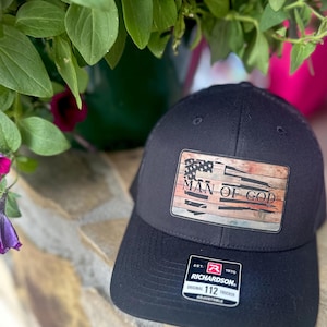 Man of God leather patch Richardson 112 Trucker Hat.