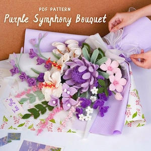 May include: A handmade crochet bouquet with purple, pink, and white flowers, wrapped in lavender paper. The bouquet includes a variety of flower types and green leaves. The text "Purple Symphony Bouquet" is visible.