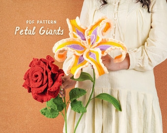 May include: A woman holds two large, crocheted flowers: a red rose and a yellow, purple, and orange lily. The image includes the text "PDF PATTERN Petal Giants" in white letters.
