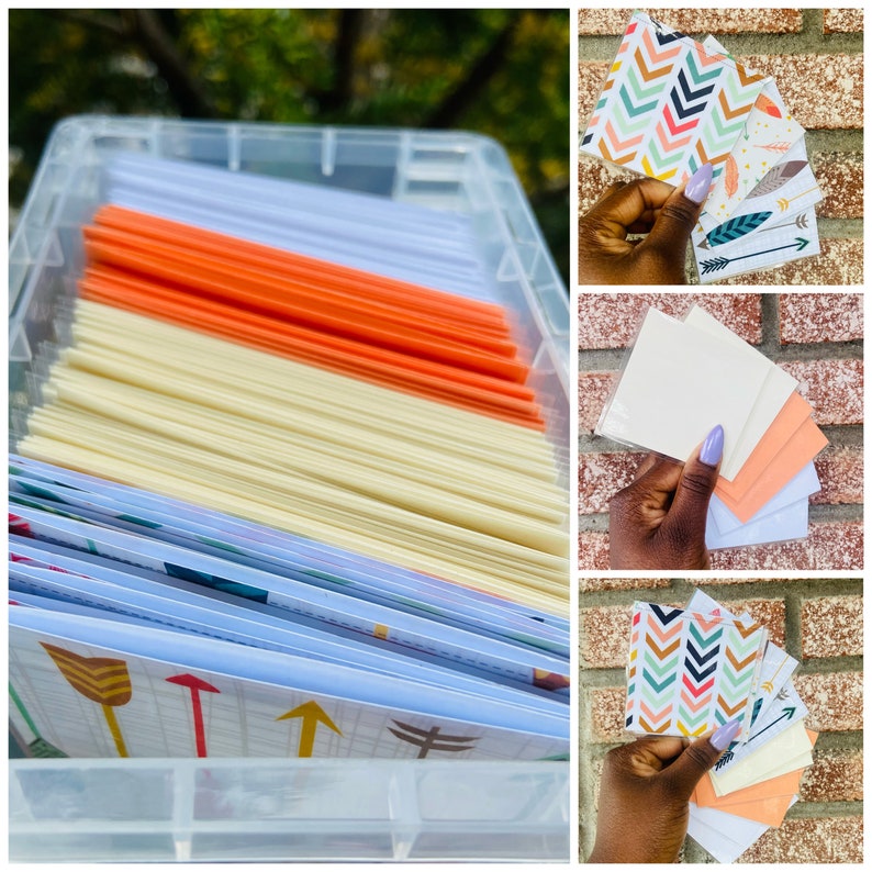 May include: A clear plastic storage container filled with stacks of colorful patterned cards. The cards have various designs, including arrows, geometric shapes, and feathers. The cards are organized by color and pattern.