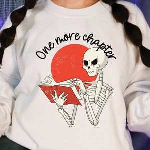 One More Chapter, Reading Skeleton Bookish Halloween Sweatshirt, Book Lover Gift, Librarian Shirt, Book Club Nerd Shirt, Dia de los Libros