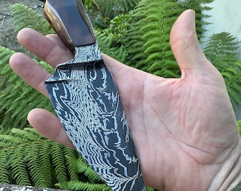 Hand forged one of a kind Damascus hunter knife